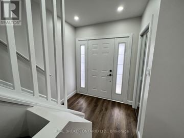 Hamilton (Crown Point) apartment for rent - A white door with a black handle is in a room with white walls.