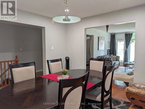 Hamilton (Gurnett) apartment for rent - A dining room with a table set for four.
