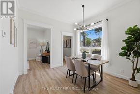 London East (East M) apartment for rent - A dining room with a table and chairs is shown.
