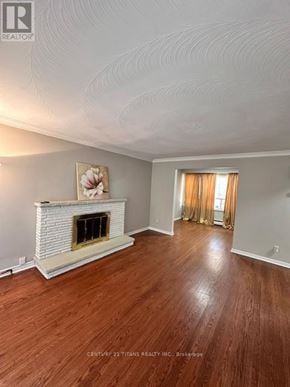 Toronto (Highland Creek) apartment for rent - A room with a fireplace and wood flooring.
