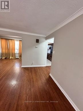 Toronto (Highland Creek) apartment for rent - A room with wooden flooring and white walls.