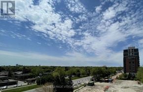 Toronto (Humber Heights) condo for rent - A construction site with a building under construction in the background.