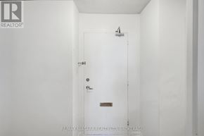 St. Catharines (Glendale/Glenridge) condo for rent - A white door with a handle and a doorknob is in a white room.