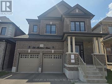 Oshawa (Eastdale) apartment for rent - A house with a garage and a sign that says Century 21 Titans Realty Inc. Brokerage.