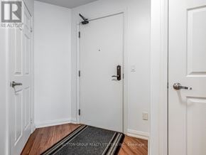 Mississauga (Hurontario) condo for rent - A hallway with a door on the left and a door on the right.