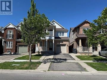 Brampton (Northwest Brampton) apartment for rent - A row of houses with the text "Royal Lefage Meadowtowne Realty, Brokerage" on the bottom.
