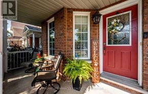 Brampton (Fletcher's Meadow) townhouse for rent - A red door with a glass window and a welcome sign.