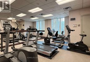Toronto (Newtonbrook East) condo for rent - A gym room with treadmills and elliptical machines.