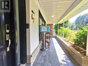 Toronto (Bayview Village) apartment for rent - A realtor sign is on the front door of a house.
