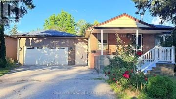Richmond Hill (Crosby) apartment for rent - A two-story house with a garage and a driveway.