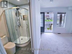 Brampton (Heart Lake East) townhouse for rent - A bathroom with a walk-in shower and toilet.