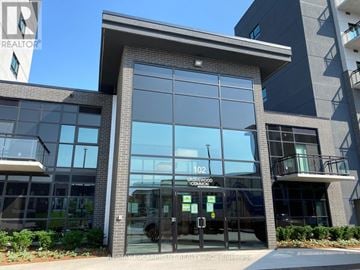 Oakville (Go Glenorchy) condo for rent - The front of a building with the number 102 on it.