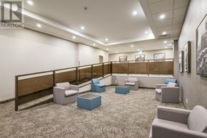 Hamilton (Durand) condo for rent - A room with a ceiling fan and wood flooring.