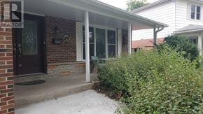 Markham (Royal Orchard) apartment for rent - A white house with a brown door and glass windows.