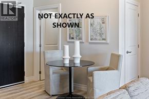 Lasalle condo for rent - A black and white photo of a room with a table and chairs.