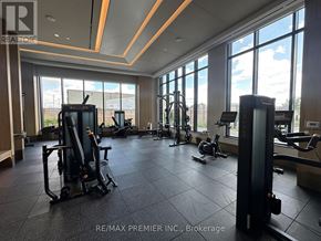 Vaughan (Vaughan Corporate Centre) condo for rent - A gym with a variety of equipment including treadmills, stationary bikes, and weight machines.