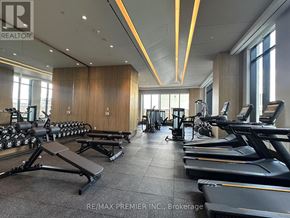 Vaughan (Vaughan Corporate Centre) condo for rent - A gym with treadmills, weights, and exercise equipment.