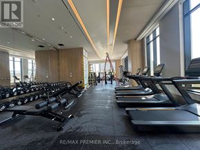 Vaughan (Vaughan Corporate Centre) condo for rent - A gym with treadmills and weights is under renovation.