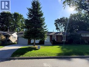 Windsor apartment for rent - A house with a tree in front of it.