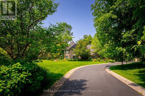 Hamilton (Carlisle) apartment for rent - A house is situated on a tree-lined street.