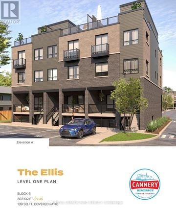Niagara Falls (Morrison) condo for rent - A blue car is parked in front of a building.