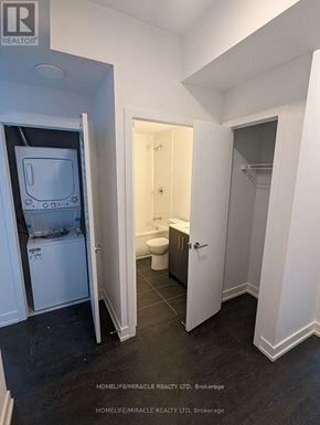 Brampton (Northwest Brampton) condo for rent - A small white bathroom with a toilet and sink.
