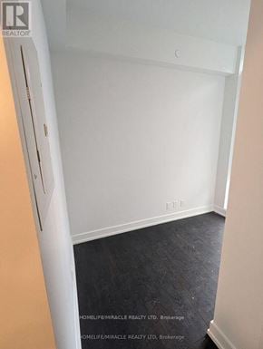 Brampton (Northwest Brampton) condo for rent - A room with a white door and a black floor.