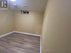 Mississauga (Central Erin Mills) apartment for rent - A room with a wooden floor and a window.