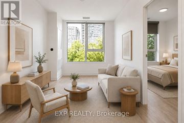 Toronto (Islington-City Centre West) condo for rent - A well-lit, modern living room with a view of the city.