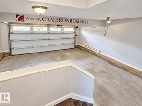 Edmonton apartment for rent - A room with a website address on the wall.