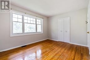 Mississauga (Lakeview) apartment for rent - A room with a wooden floor and a window.