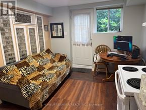 Markham (Thornhill) apartment for rent - A bedroom with a bed, desk, chair, and window.