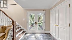 Markham (Bayview Glen) apartment for rent - A foyer with a staircase and a glass door.