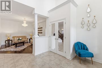 London North (North M) apartment for rent - A living room with a blue chair and a couch.