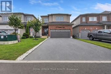 Ottawa apartment for rent - A residential area with houses and a car parked in front of one.
