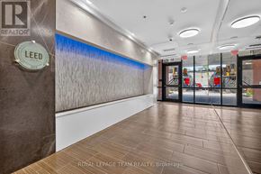Ottawa condo for rent - A hallway with a LEED logo on the wall.
