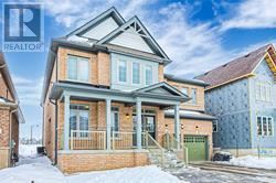 East Gwillimbury (Queensville) apartment for rent - A house with a brown roof and a green door is shown.