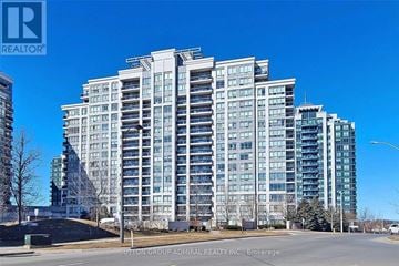 Vaughan (Beverley Glen) condo for rent - A tall residential building with many windows is shown.