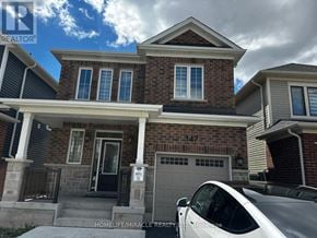 Milton (Cb Cobban) apartment for rent - A two-story brick house with a garage and a car parked in front.
