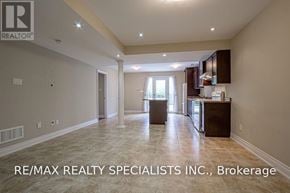 Mississauga (East Credit) apartment for rent - A spacious room with a kitchen area and a dining table.