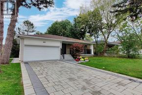 Toronto (Newtonbrook East) apartment for rent - A house with a driveway in front of it.