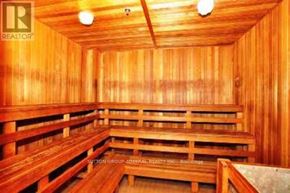 Toronto (Bay Street Corridor) condo for rent - A sauna with wooden benches and walls.