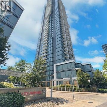Toronto (Henry Farm) condo for rent - A tall residential building with a sign that reads "ALTO PARKSIE".