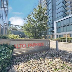 Toronto (Henry Farm) condo for rent - A sign that says "LTO PARKSIDE 55" is in front of a building.