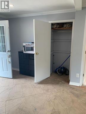 Caledon (Palgrave) apartment for rent - A room with a Hamilton Beach microwave on a cabinet.