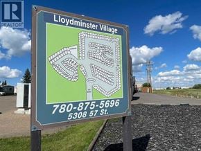 Lloydminster apartment for rent - A sign for Lloydminster Village with a phone number and address.