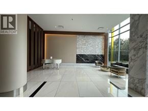 Burnaby apartment for rent - A white marble floor in a room with a large window.