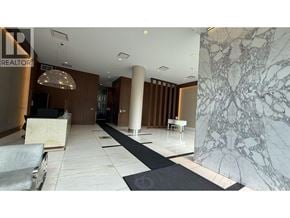 Burnaby apartment for rent - A marble wall with a black and white pattern is on the right side of the image.