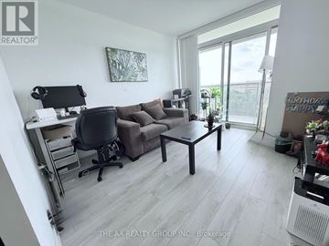 Toronto (Yorkdale-Glen Park) condo for rent - A living room with a couch, chair, and desk.