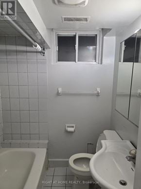 Toronto (Thistletown-Beaumonde Heights) apartment for rent - A bathroom with a toilet, sink, and bathtub.